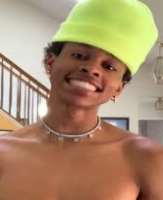 White has four piercing in both of his ears and also loves to wear a chain in his neck White has four piercing in both of his ears and also loves to wear a chain in his neck.